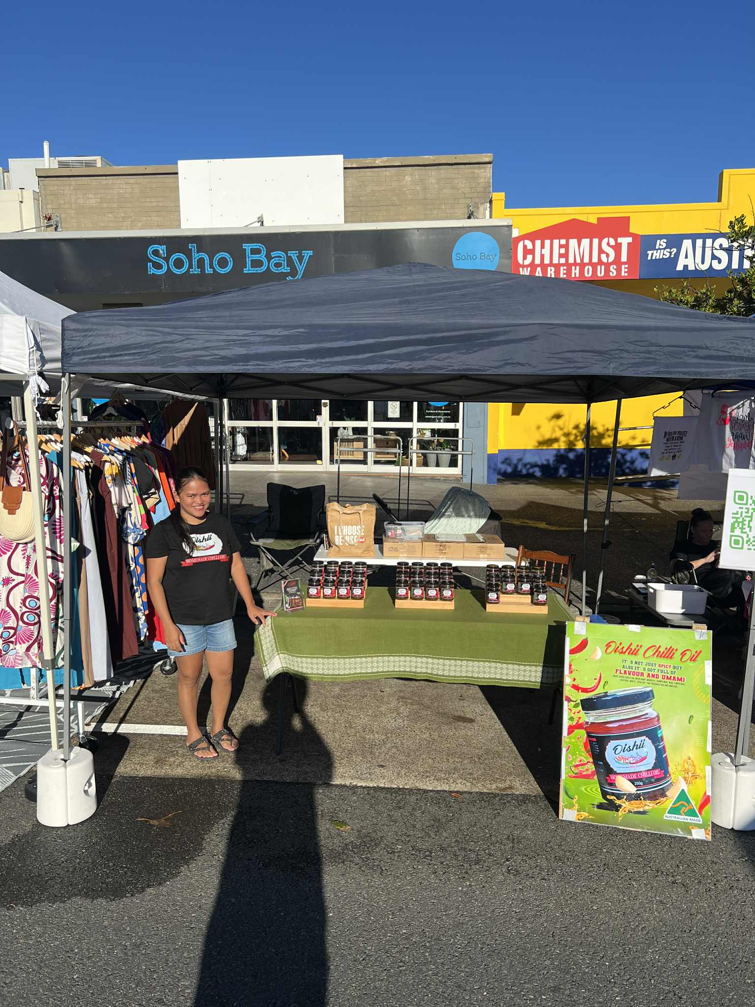 Happy customer with a jar of Oishii