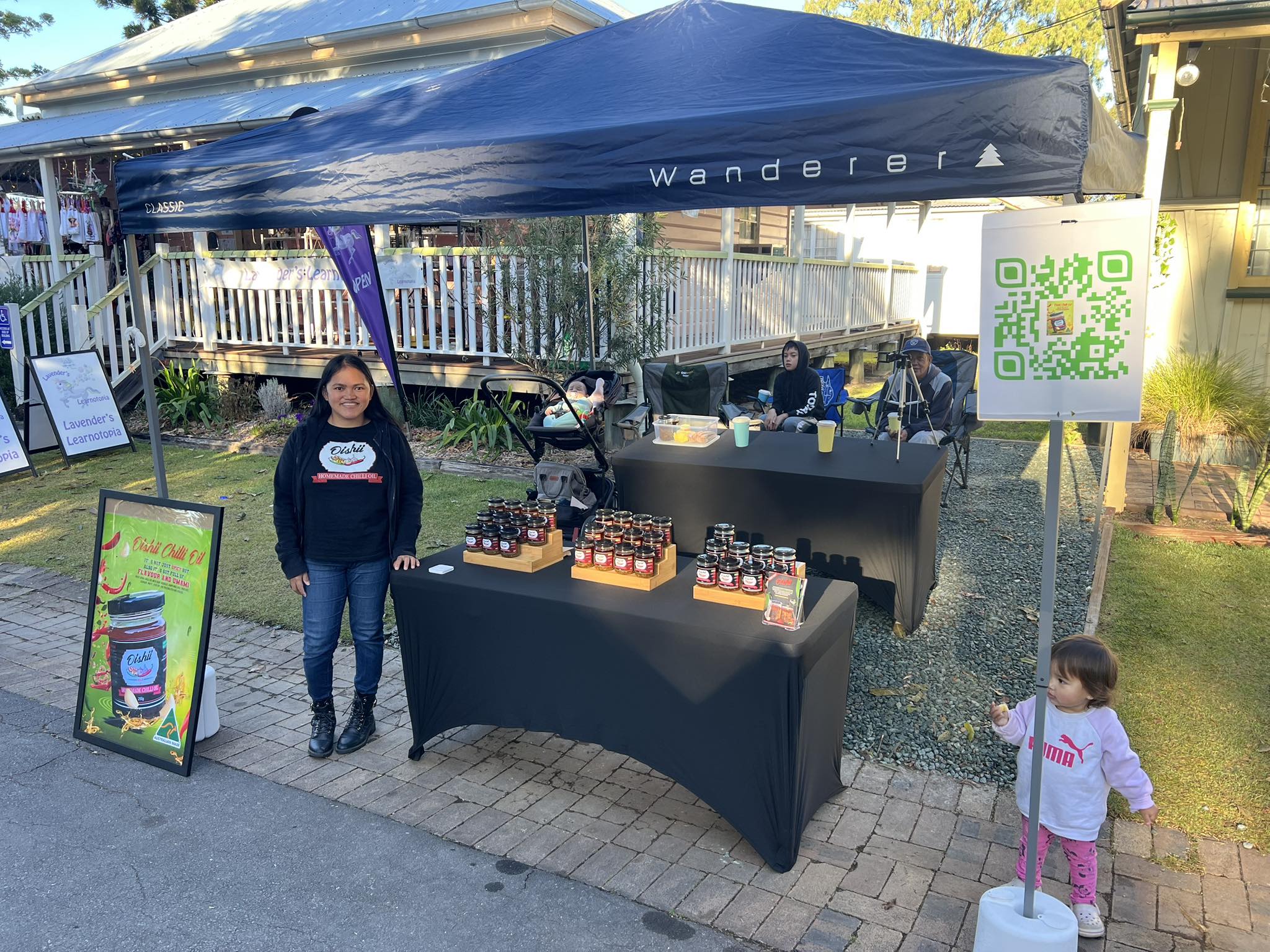 Happy customer with a jar of Oishii